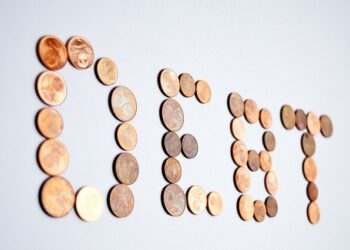 When should my business consider using a Manchester based debt collection agency?